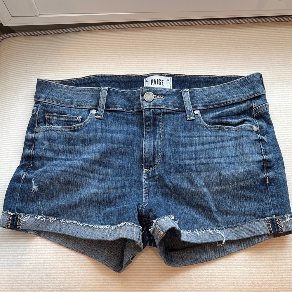PAIGE Indigo Frayed Hem Denim Shorts